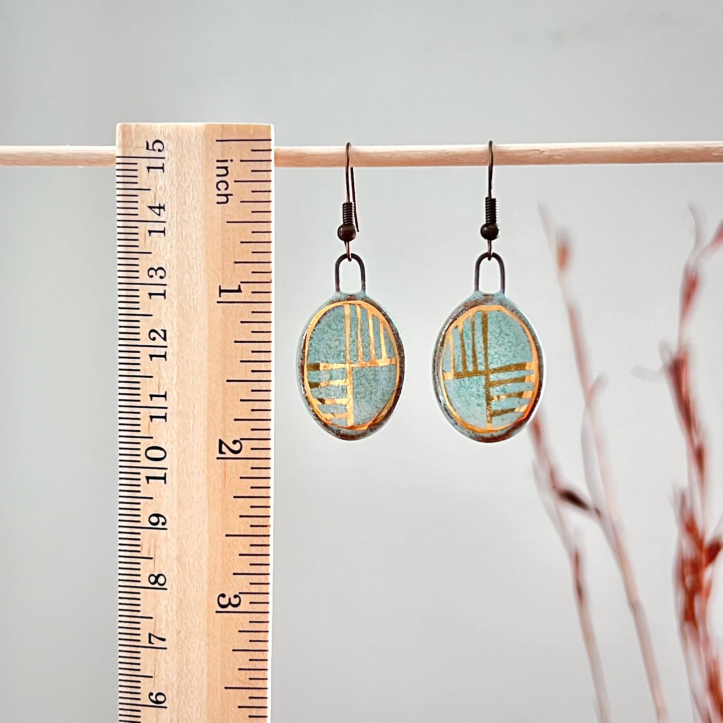 Turquoise Oval Earrings with Gold Lines